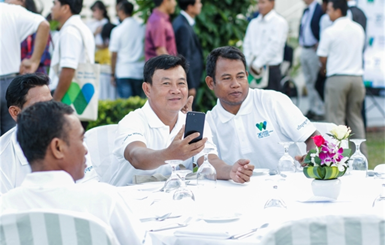 (Left) Mr. Koeng Hoklieang (holding his phone) and (right) Mr. Kheang Viry. They are government counterpart and Patrol Team Leaders at Kulen Promtep Wildlife Sactuary, Preah Vihear province. CREDIT WCS Cambodia